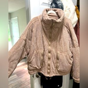 Puffy tan zip up jacket